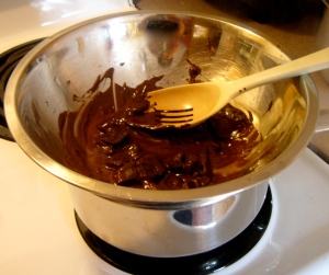 An improvised double-boiler, using a saucepan and metal bowl