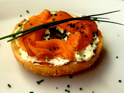 Chive cream cheese with smoked salmon on a toasted bagel
